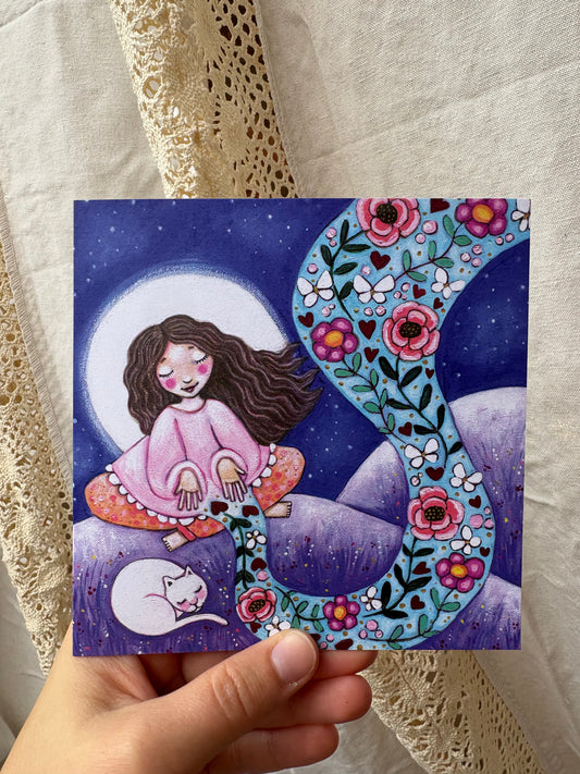 Flow greeting card: hand-painted illustration of a girl meditating on a hill under a full moon, with a sleeping cat, flowering vines and butterflies, from What Makes Your Heart Sing